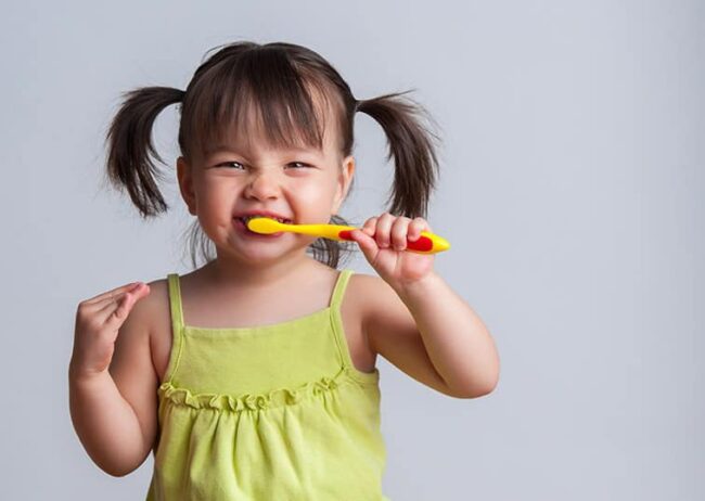 Little-girl-brushing-her-teeth