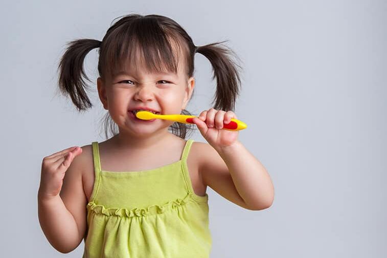 Little-girl-brushing-her-teeth
